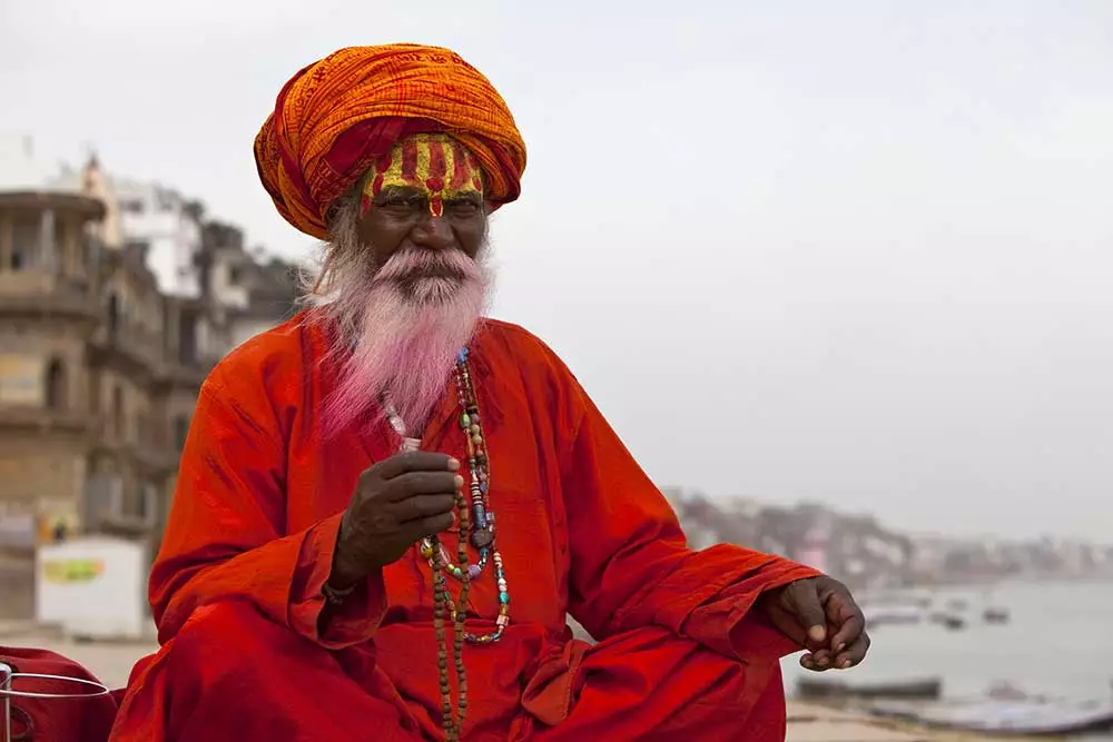 Which city in India lies on the River Ganges and is considered one of Hinduisms most holy places?