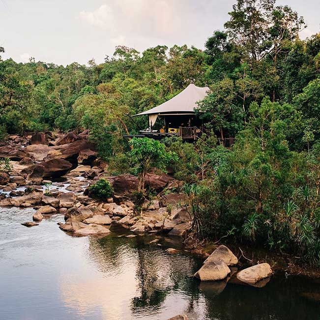 The rainforest-cloaked Cardamom Mountains are Cambodia&rsquo;s best-kept secret. Elevate your experience with a stay in a safari-style suite at Shinta Mani Wild, an ultra-luxe tented camp inside an 865-acre private nature reserve.&nbsp;